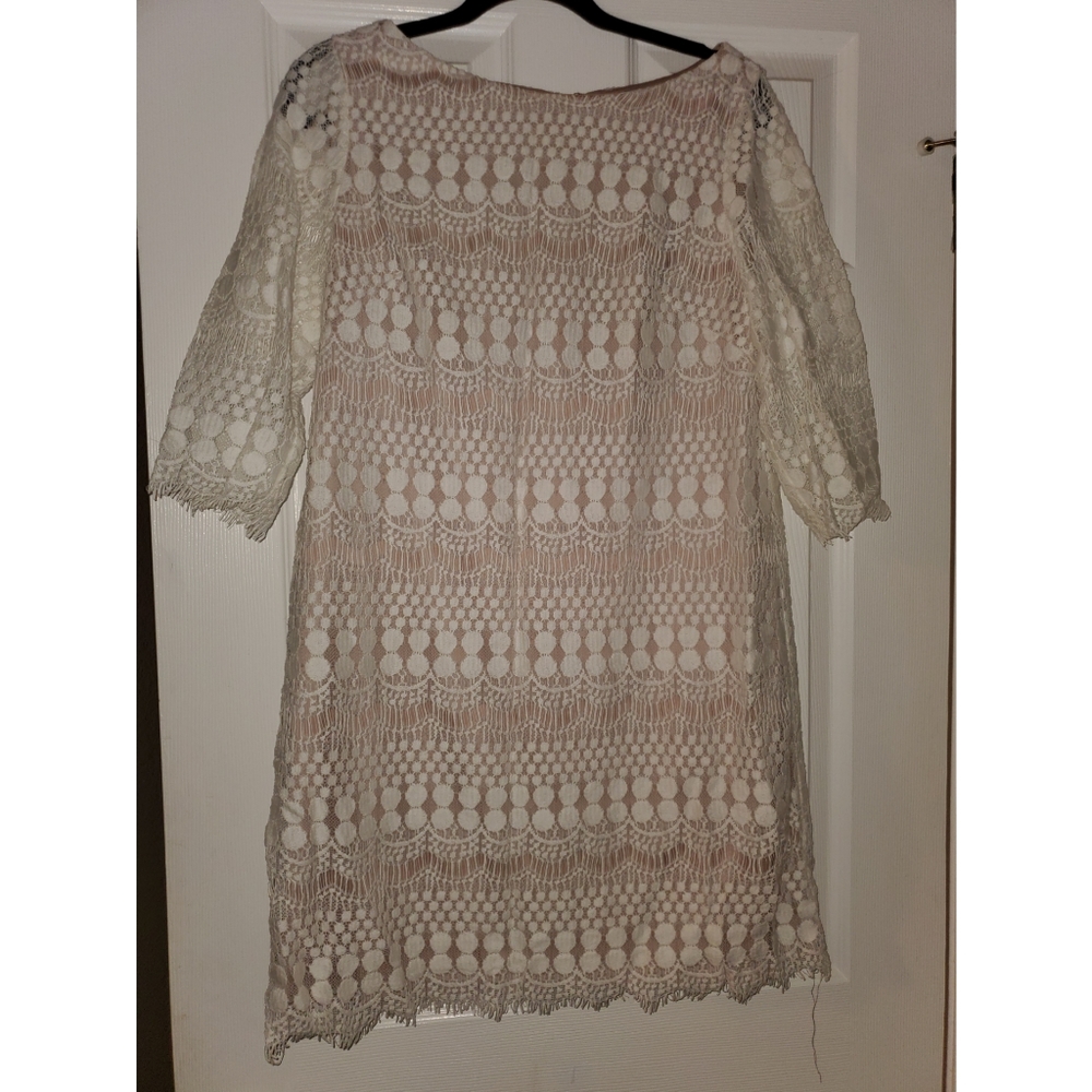White lace dress with nude underlay